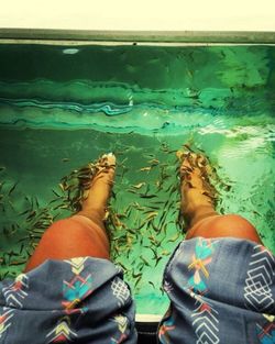 Low section of woman in water