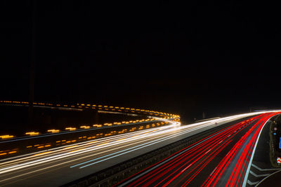 Light trails on road at night