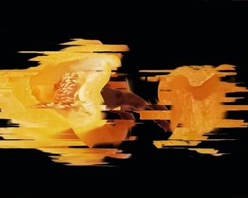 Close-up of drink against black background