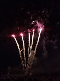 Firework display at night