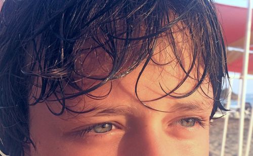 Close-up of boy wet hair
