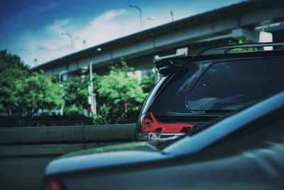 Reflection of car on side-view mirror