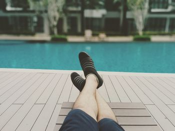 Low section of man in swimming pool