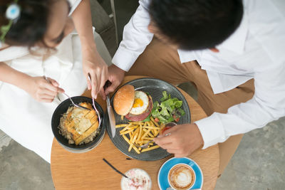 Couple having food in restaurant