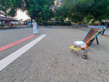 Empty bench in park