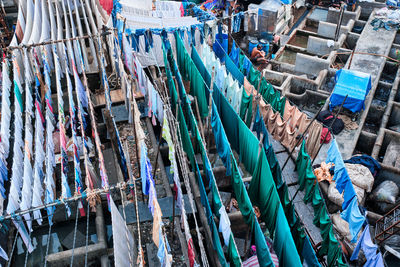 Mahalaxmi dhobi ghat is open air laundromat lavoir in mumbai, india with laundry dry on ropes