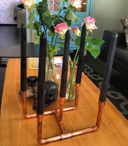 Close-up of vase on table at home