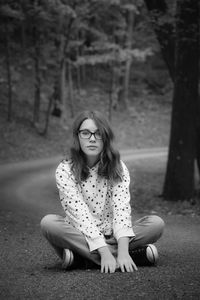 Portrait of teen sitting outdoors