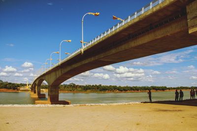 Bridge over sea against sky