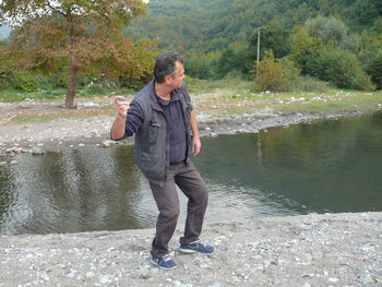 Man standing in lake