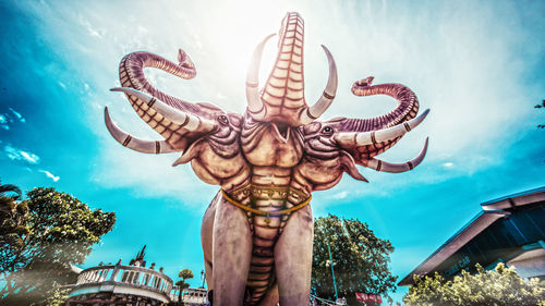 Low angle view of statue against sky