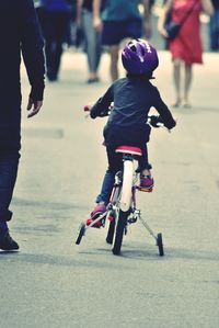 Low section of boy walking