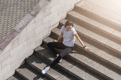 Man sitting on staircase