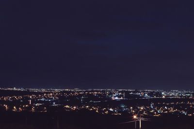 Illuminated cityscape at night