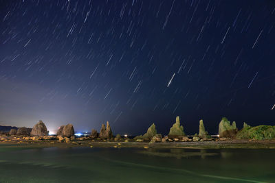 Scenic view of star field against sky at night