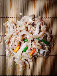 High angle view of meat on barbecue