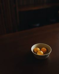 High angle view of fruits in bowl on table