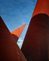 Low angle view of factory against sky