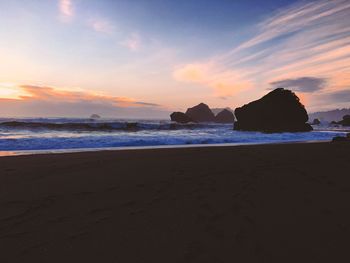 Scenic view of sea at sunset