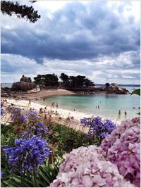 Scenic view of sea against cloudy sky