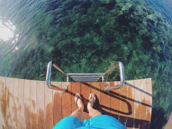 Low section of man in swimming pool