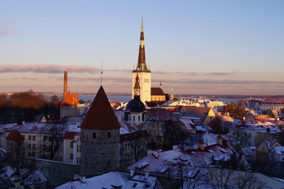 High angle shot of townscape against blue sky