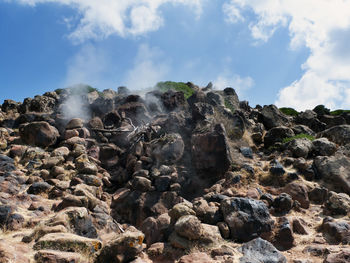 Scenic view of rock formation against sky