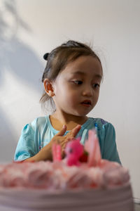 Asian cute little princess at 3rd birthday party.
