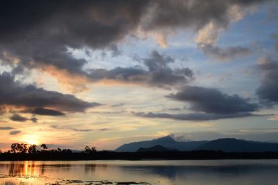 Scenic view of lake against sky during sunset