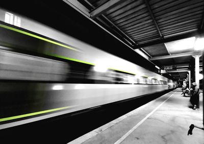 Blurred motion of train at trainstation 