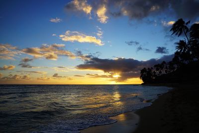 Scenic view of sea against sky at sunset