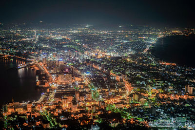 Illuminated cityscape at night