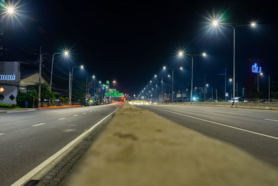 Surface level of empty road at night