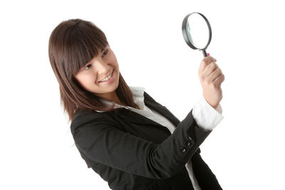 Portrait of a smiling young woman over white background