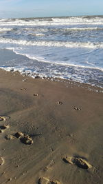 Wet sand on beach