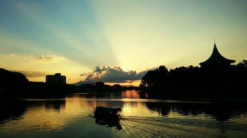 Silhouette of buildings at sunset