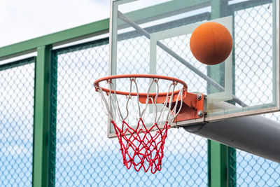 Low angle view of basketball hoop