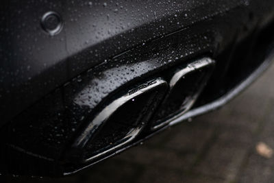 Close-up of raindrops on car