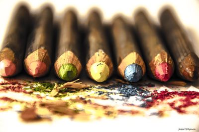 Close-up of colored pencils on table