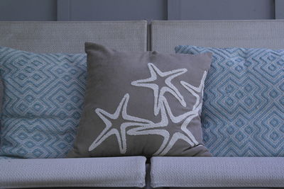 Starfish pillow on a couch