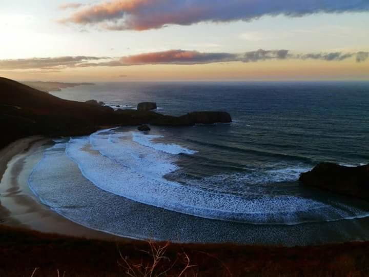 SCENIC VIEW OF SEA DURING SUNSET