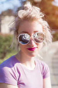 Portrait of woman wearing sunglasses