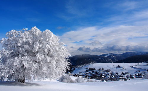 Scenic view of mountains against sky during winter