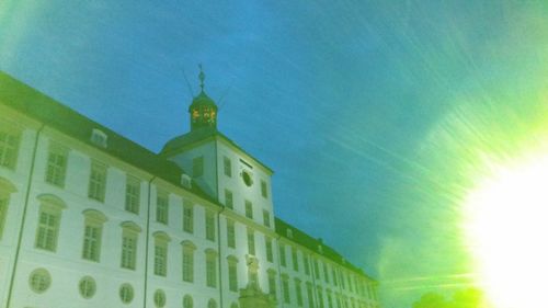 Low angle view of building against blue sky