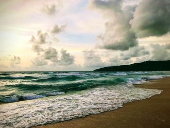 Scenic view of beach against sky