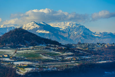 Majestic view of the snow-covered carega complex from the sovizzo hills in vicenza italy