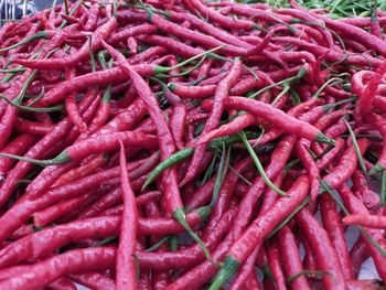 Full frame shot of red chili peppers for sale at market