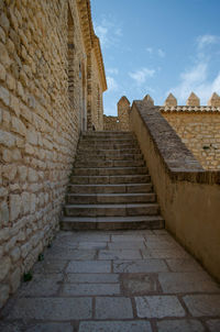 Steps leading towards stone wall