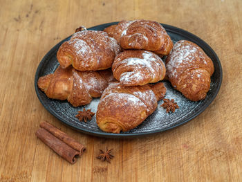 High angle view of cookies in plate on table
