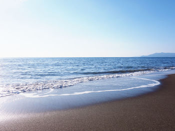 Scenic view of sea against clear sky